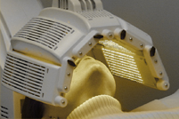 Visuel de la machine Omnilux &eacute;quip&eacute;e de la t&ecirc;te Omnilux Plus.